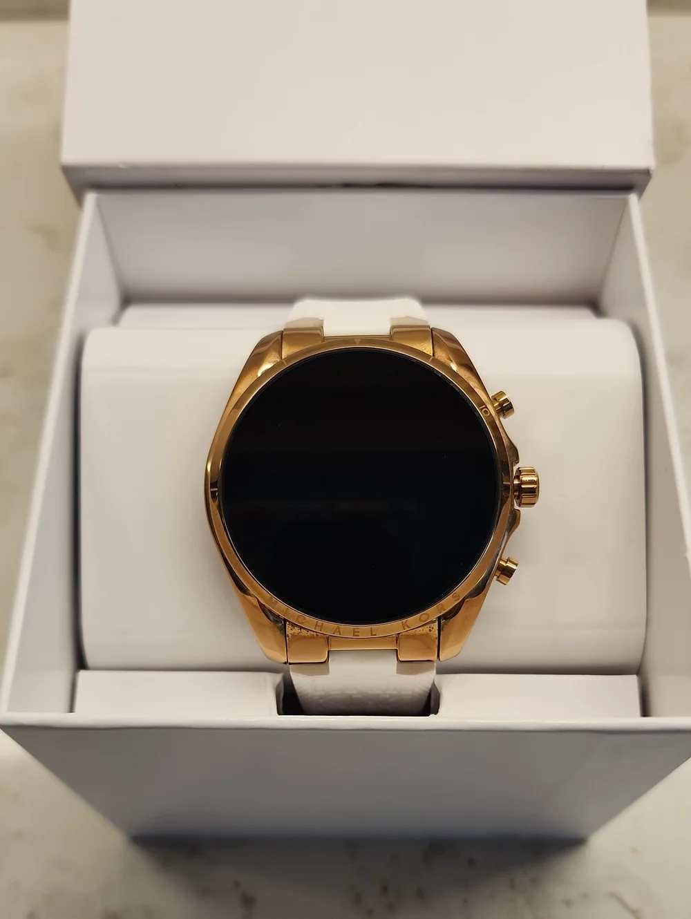 Michael Kors Gold-Tone Smartwatch with White Strap. Extra Color Bands Included.